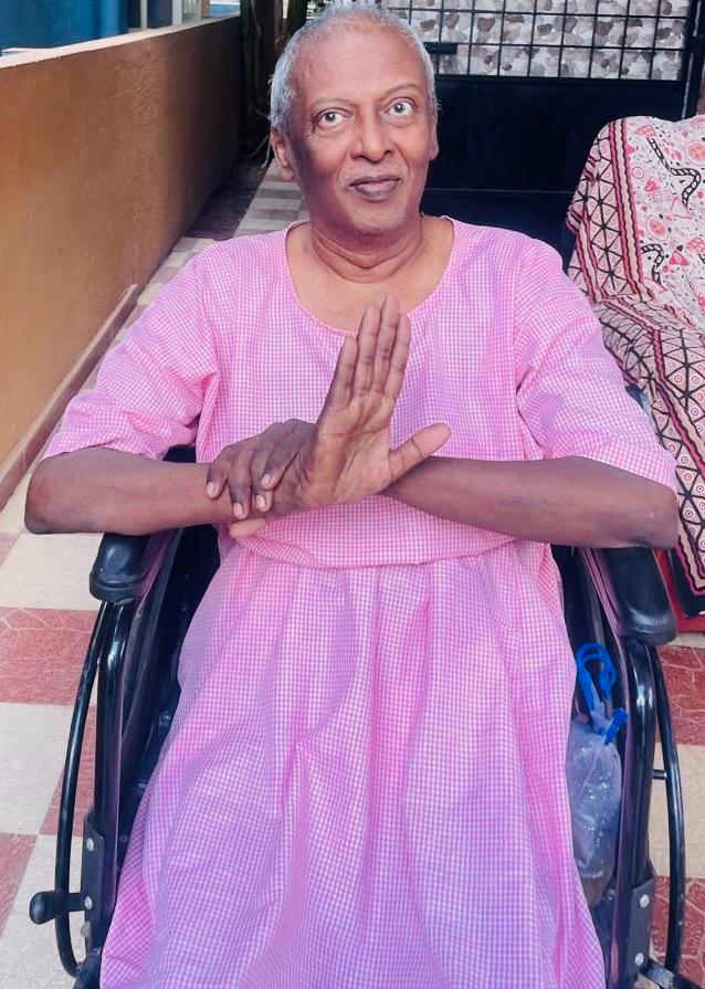Senior resident using a wheelchair at Bangalore Care Takers