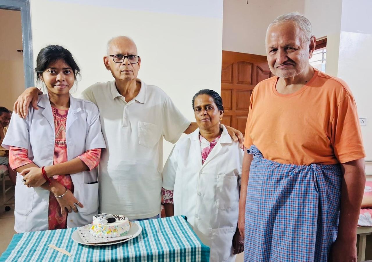 Care staff and residents celebrating together at Bangalore Care Takers