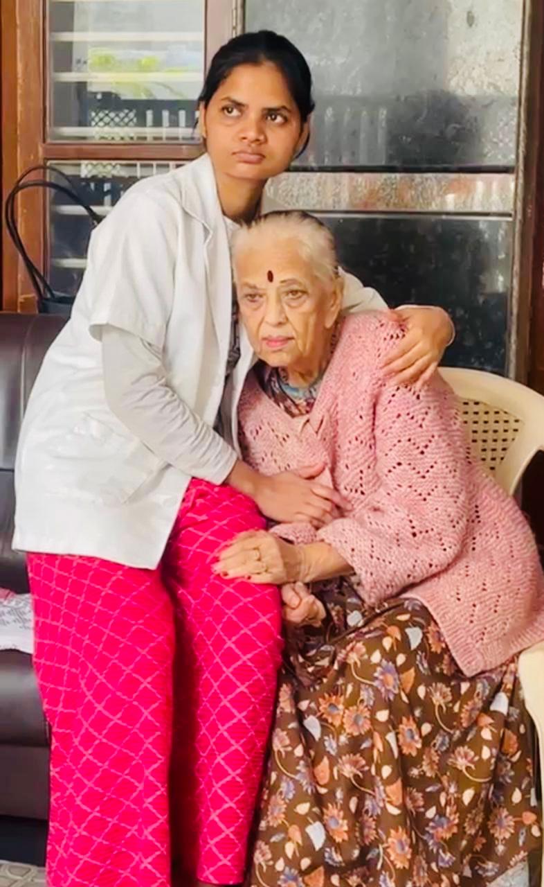 Caregiver providing compassionate support to a senior resident