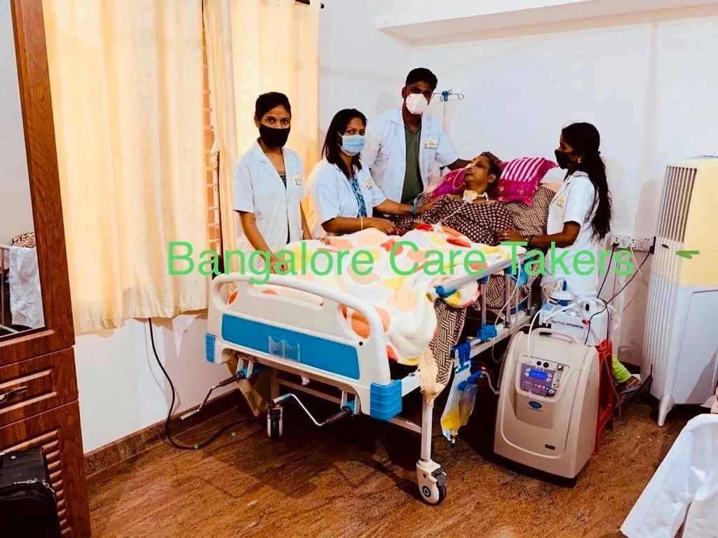 Home nursing care team supporting an elderly patient in Bangalore